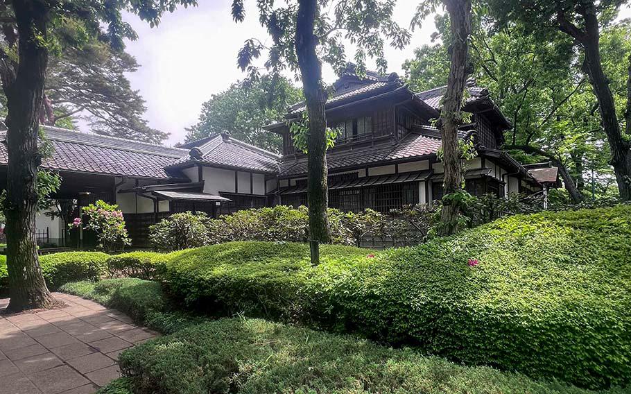 A Japanese-styled building and Japanese garden.